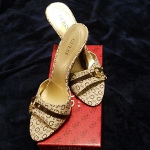 Open toe Guess signature heels...never worn.